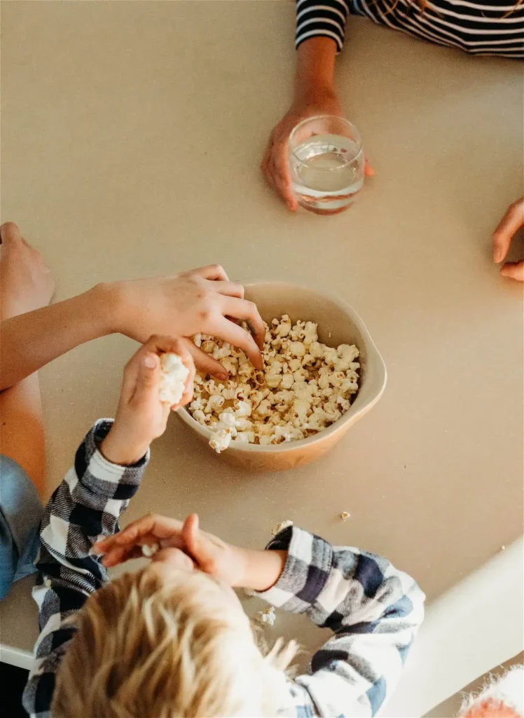 Emma Richards - eating popcorn